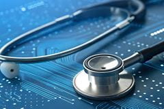 Image-of-stethoscope-resting-on-circuit-board