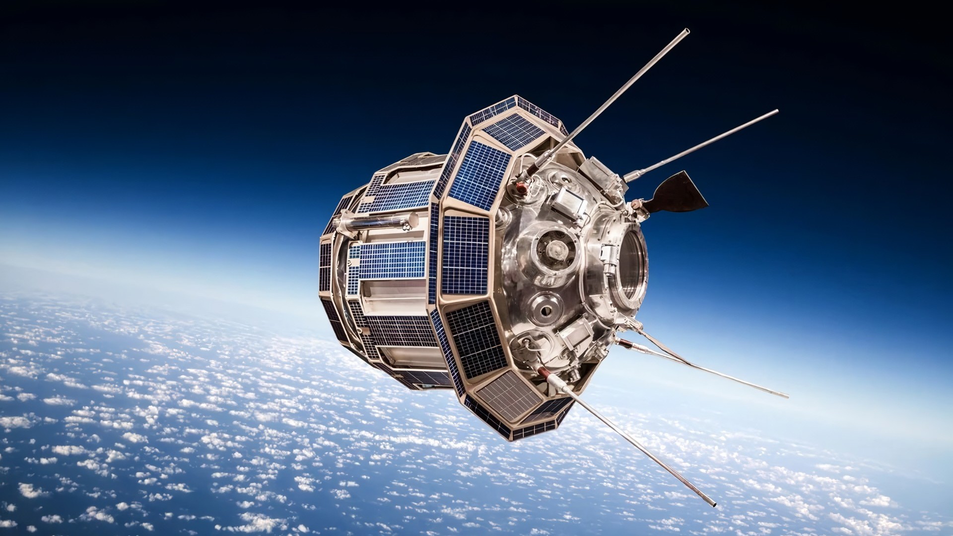 태양 전지가 장착된 위성이 지구 상공을 궤도에서 도는 상세한 모습